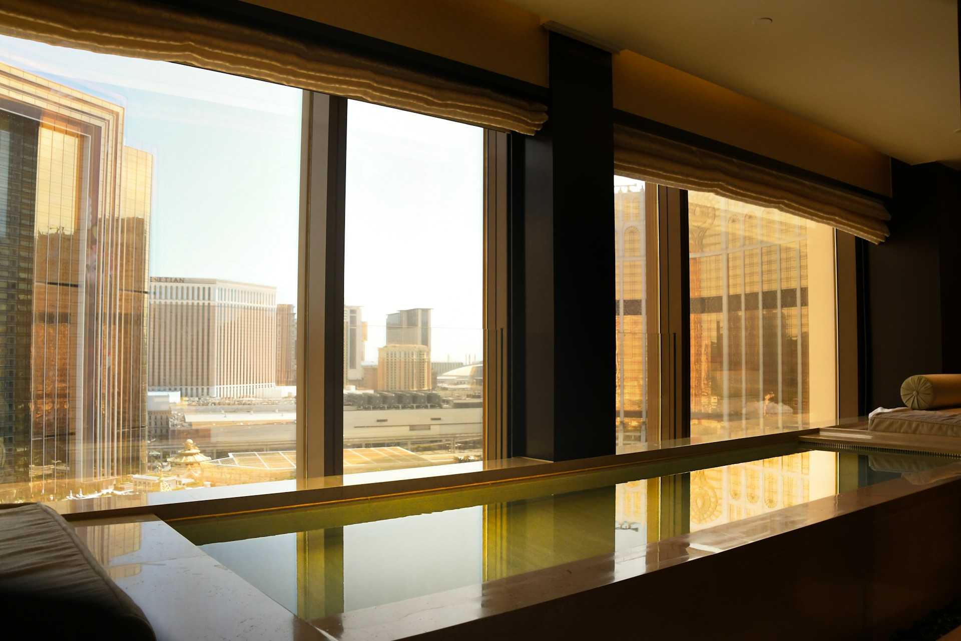 A serene boutique hotel suite at golden hour